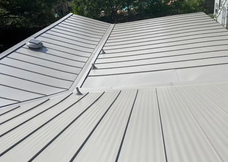 Solar attic fan installed on a metal roof for Roof Ventilation in Port Charlotte
